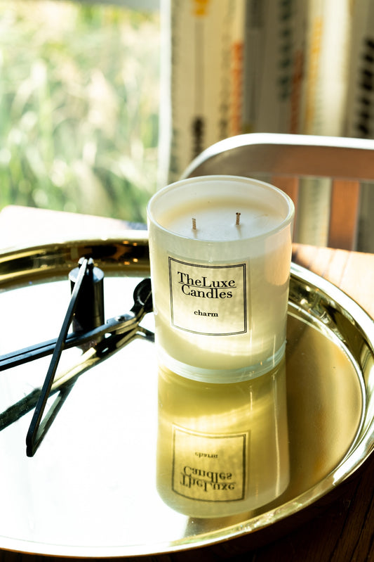 earthy candle with blends of white floral , amber and woods