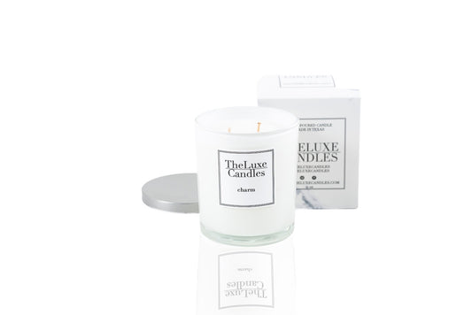 earthy candle with blends of white floral , amber and woods